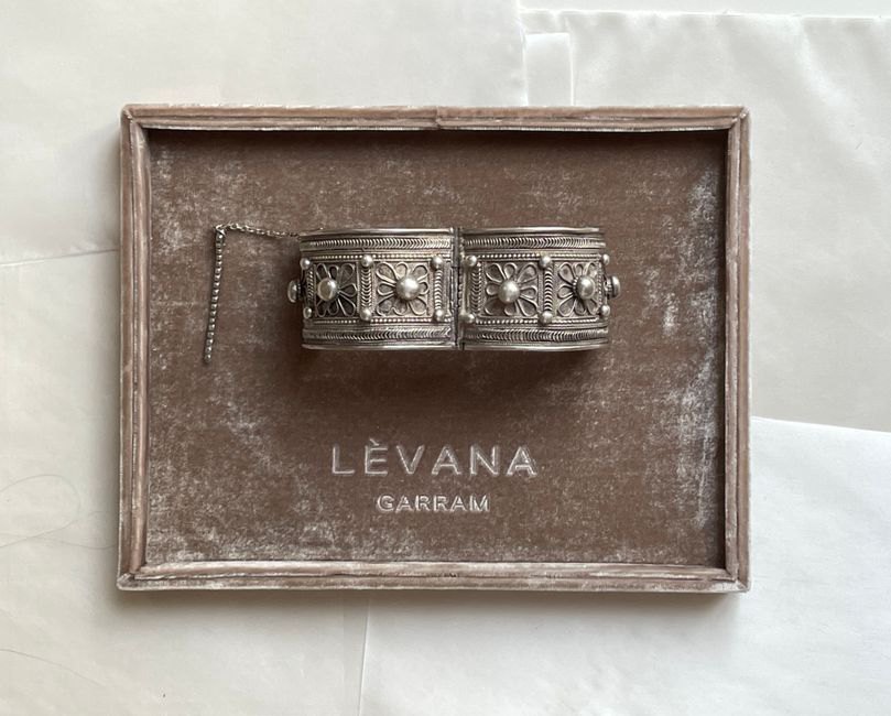 Tortoiseshell hair comb from the 1890s on a velvet archival tray
