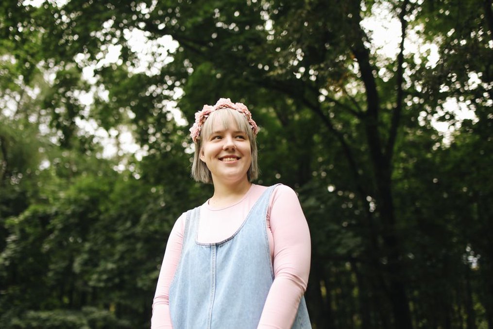 blush silk roses on a vintage headband against a cream background