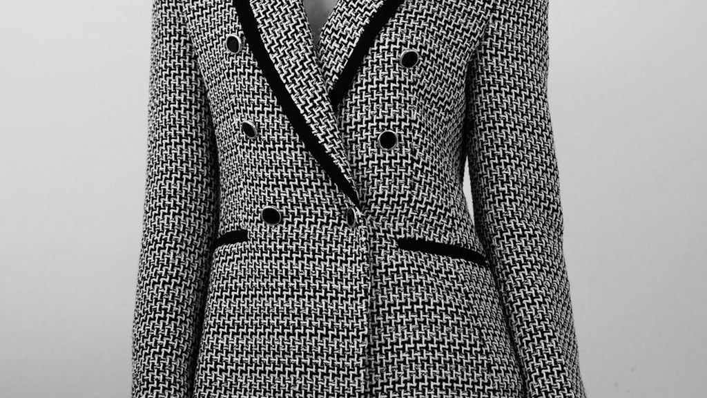 A classic wool blazer paired with an ornate vintage hair comb