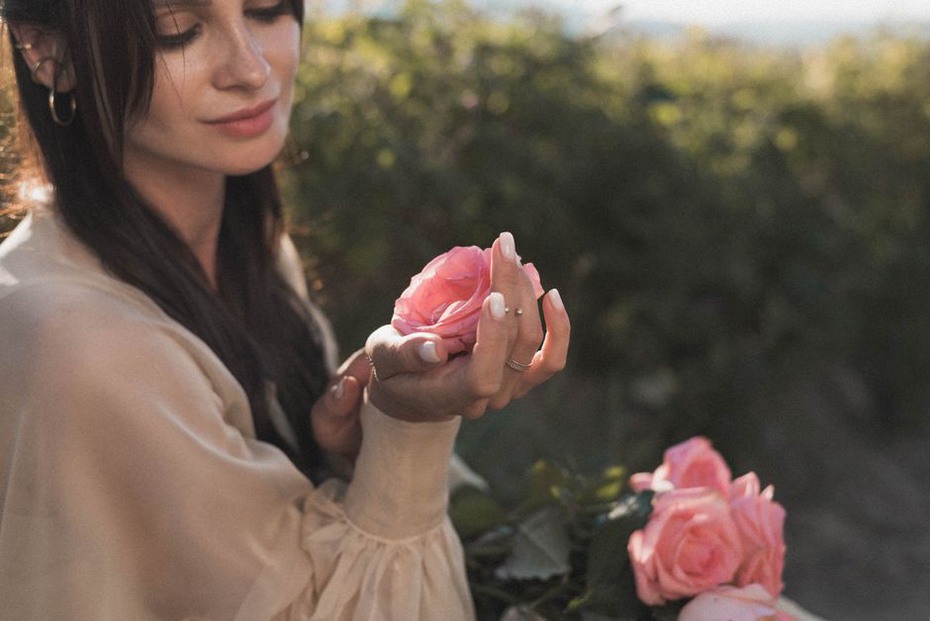 close-up of hand-crafted silk rose petals with wire edge and velvet leaves