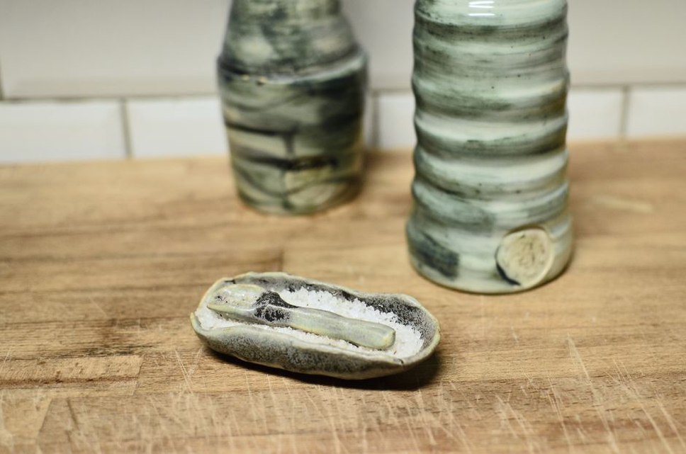Close-up of a vintage bottle green enamel serpent hair clip