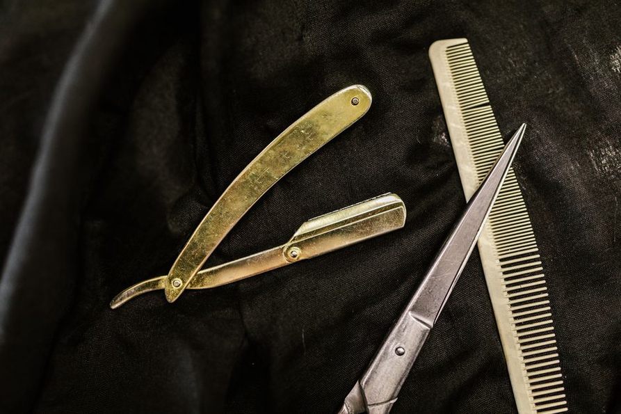 Close-up of tortoiseshell and celluloid combs showing material grain