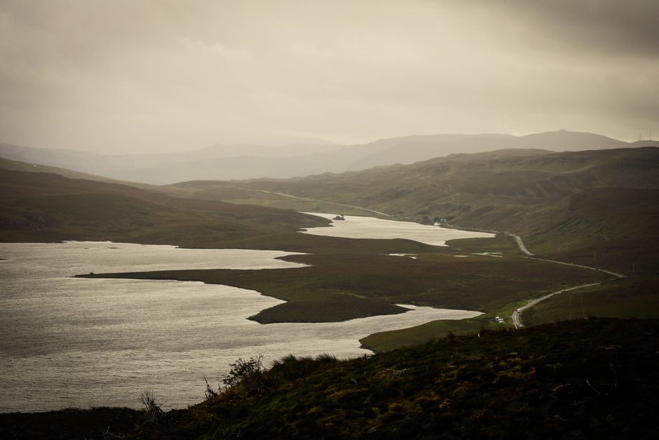 Heather and loch colours on a misty Skye hillside