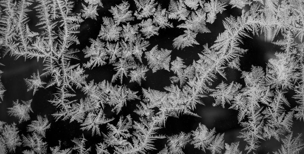 Three snowflake barrettes showing silver plate, rhodium, and enamel finishes from the Snow Flake 2 series