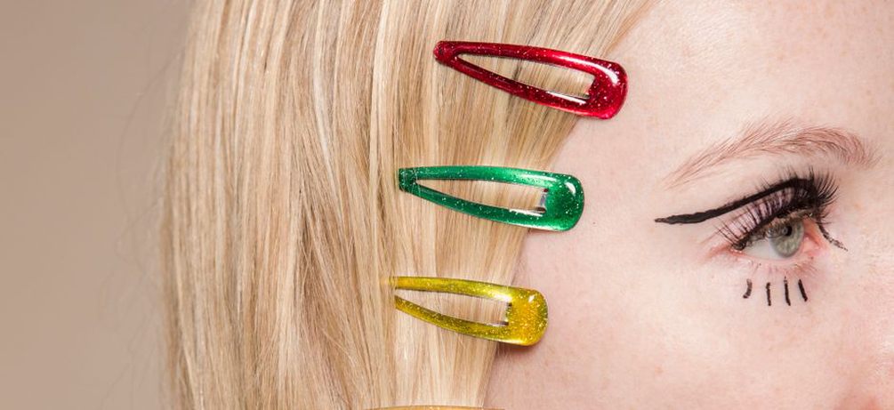 An array of vintage cone hair clips in various materials and colours on a light background