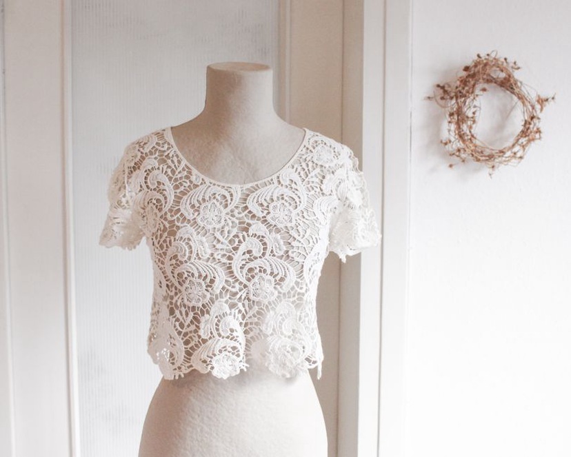 Ivory lace dress with scalloped hem and three-quarter sleeves