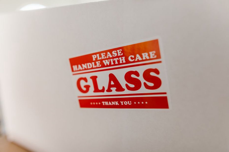 tortoiseshell barrette in bubble wrap beside a Royal Mail tracked label