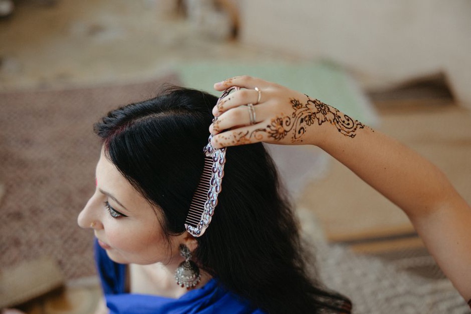 Hand-painted rose motif on a 1950s Hettie acetate comb