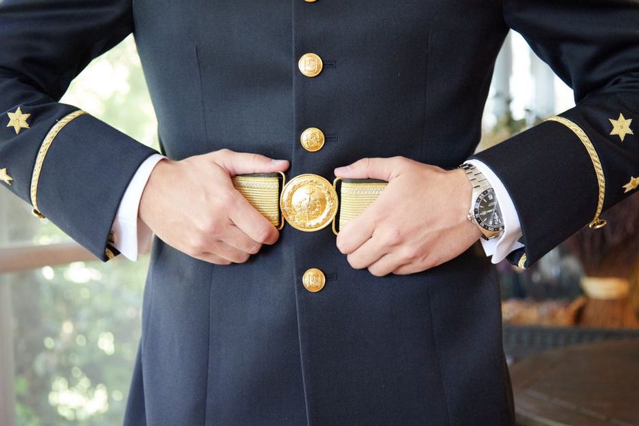 classic navy blazer with brass buttons in a vintage styling shot