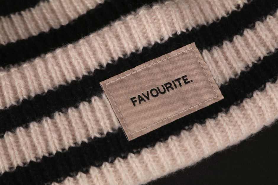 Cream woven label with Store P398 and Union Jack stamp