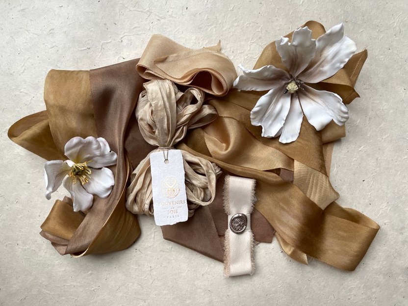 A collection of vintage silk ribbons displayed elegantly