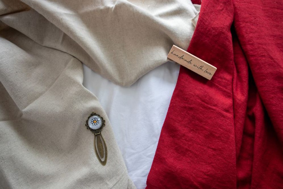 tortoiseshell bow barrette resting on a linen cloth