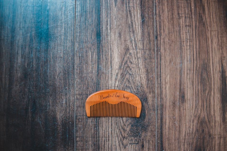 Hand-carved tortoiseshell hair comb with intricate floral motif
