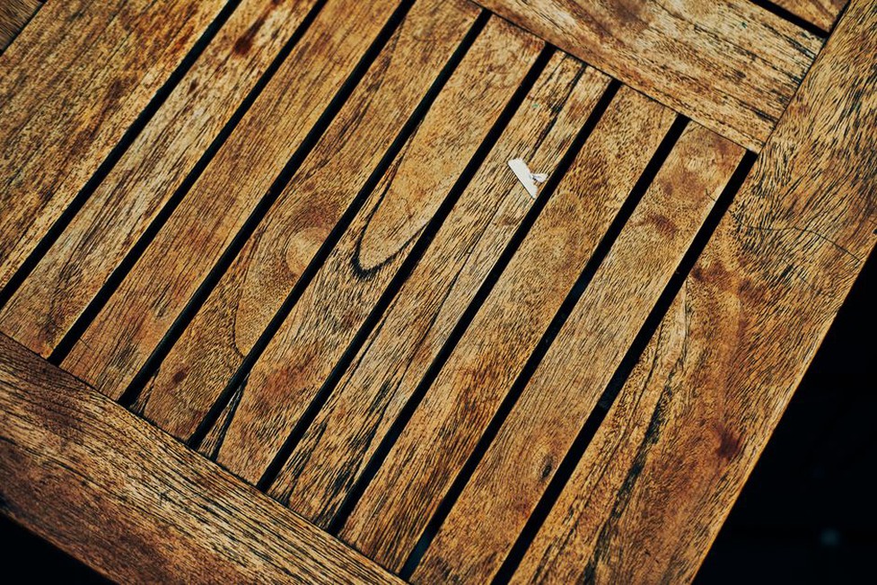 Tortoiseshell rectangle hairclip from the 1950s, photographed on a vintage oak surface
