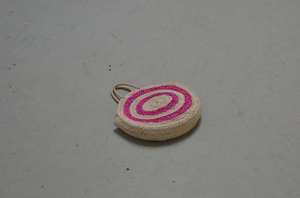 Small woven reed basket hair ornament with metal clip