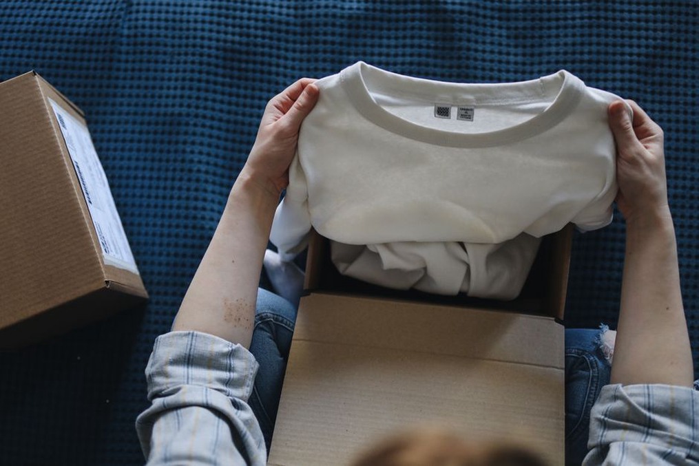 Folded vintage T-shirt in a preservation box with tissue paper inserts