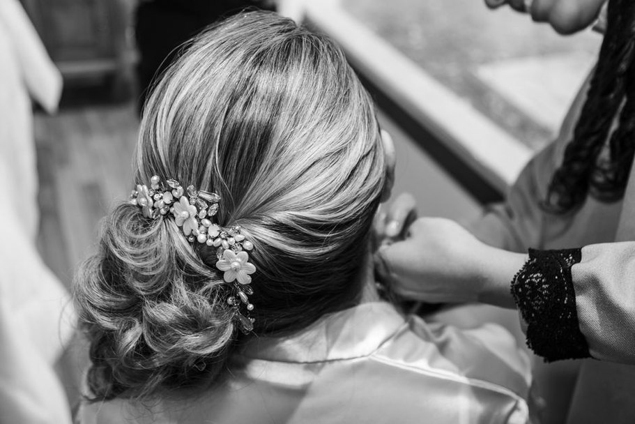 Silver hair comb styled in a modern chignon