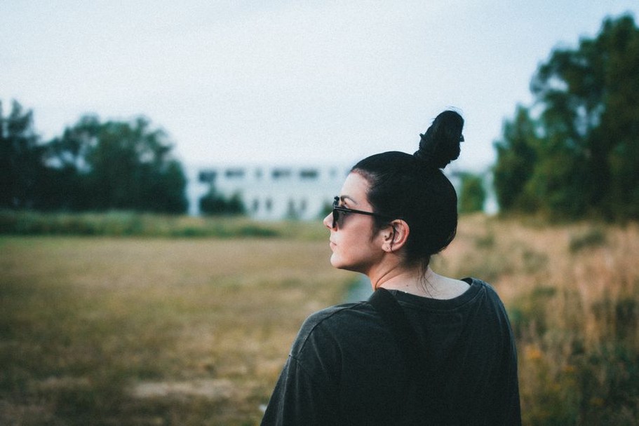 low chignon secured with a toffee hair claw