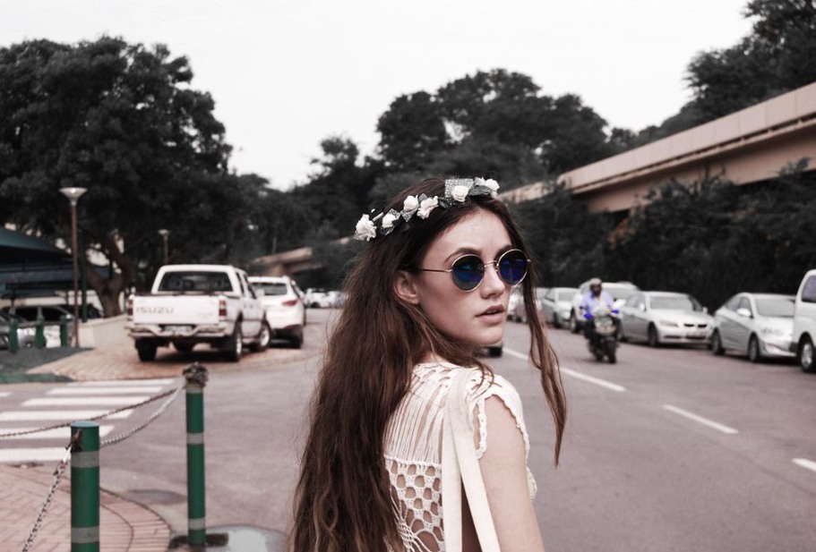 A contemporary outfit styled with a 1940s fabric rose crown headband