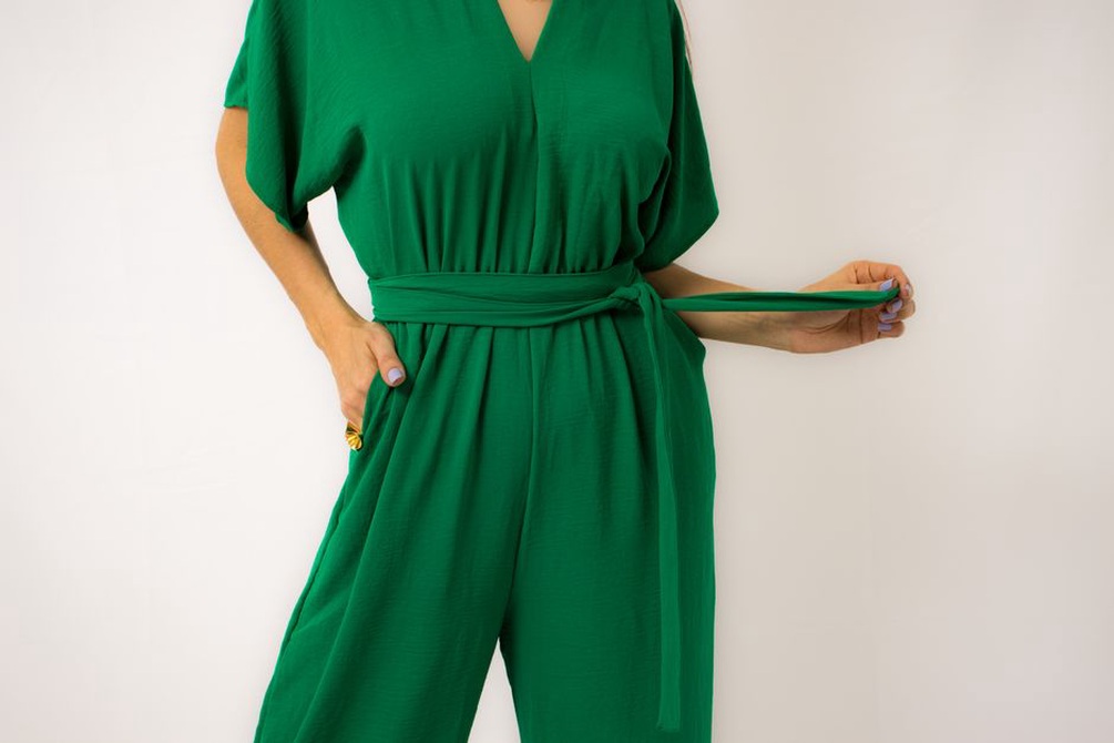 A Leah jumpsuit in deadstock viscose crepe, styled with a vintage tortoiseshell hair clip