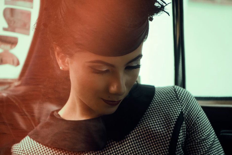 A classic 1960s beehive hairstyle with decorative pins