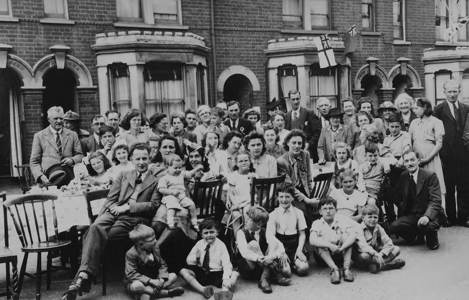 Women wearing tied scarves during wartime work