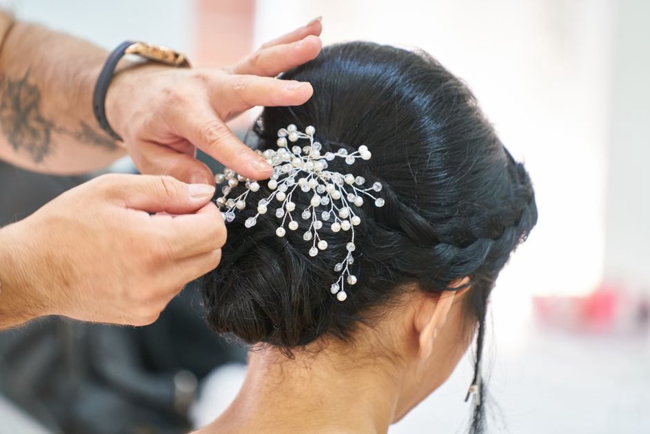 Plain steel pins beside ornate hair ornaments