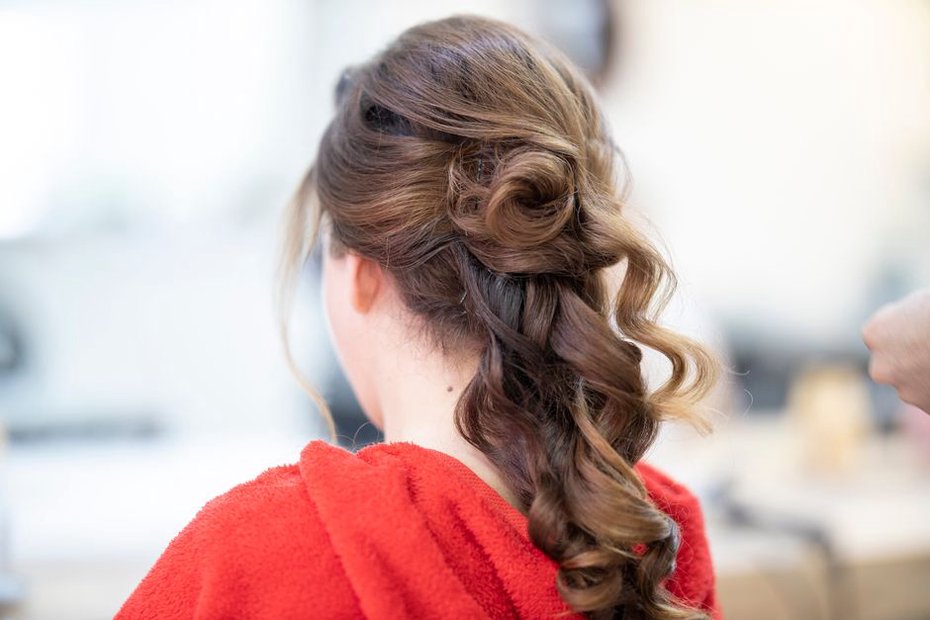 Decorative comb set above a softly gathered twist